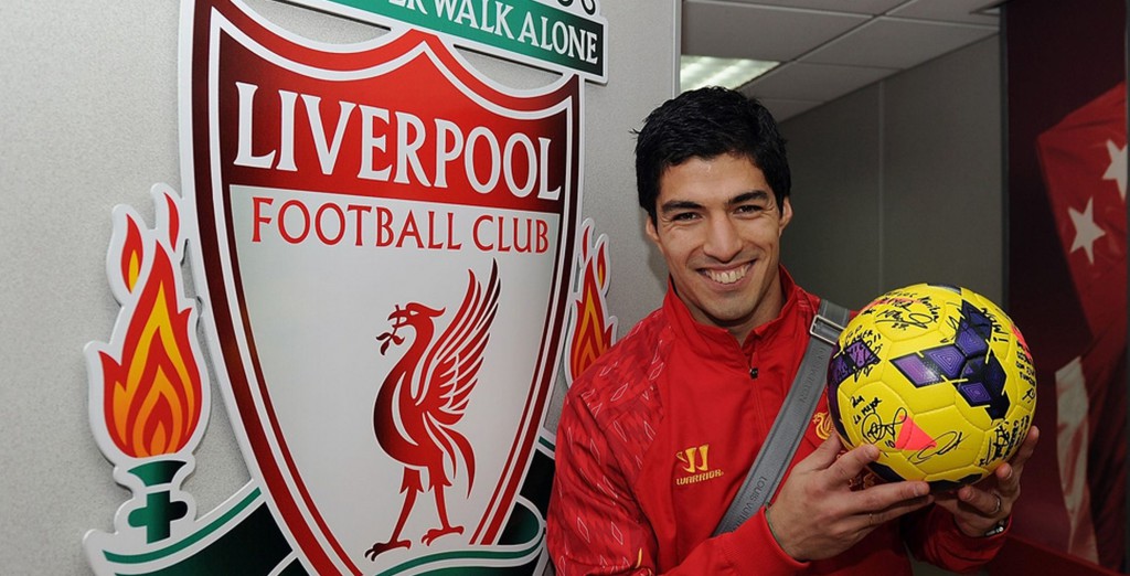 LIVE-Luis-Suarez-of-Liverpool-celebrates-with-the-hat-trick-ball-2901049