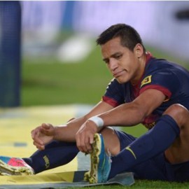 FC Barcelona's Alexis Sanchez, from Chile, reacts during a Spanish La Liga soccer match against Betis at the Camp Nou stadium in Barcelona, Spain, Sunday, May 5, 2013. (AP Photo/Manu Fernandez)